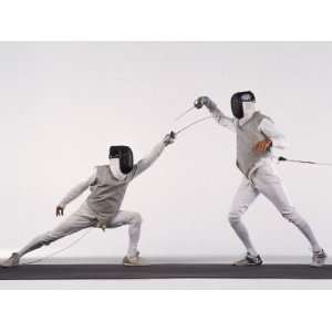  Male Fencer Making Lunging Attack in Foil Photographic 