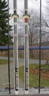 The skis are signed KARHU. Measures 83 (215 cm) long. Have 3 pin 75 