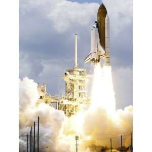   Off from its Launch Pad Toward Earth Orbit Premium Poster Print, 24x32