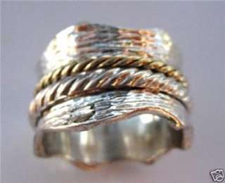 Sterling silver 9 carat gold spinner ring