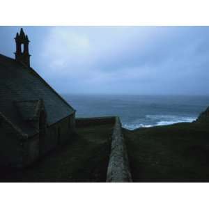 Silhouette of Church Spire Against Blue Sky in Pointe Du Vau Along 