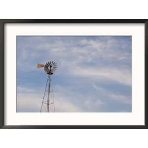 Windmill Stands Tall against a Cloudy Sky at Stevens Creek Farm 