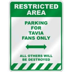   PARKING FOR TAVIA FANS ONLY  PARKING SIGN