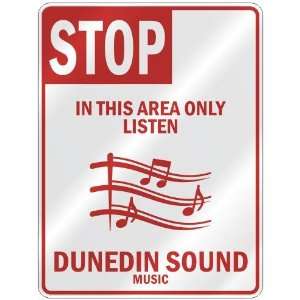  STOP  IN THIS AREA ONLY LISTEN DUNEDIN SOUND  PARKING SIGN MUSIC 