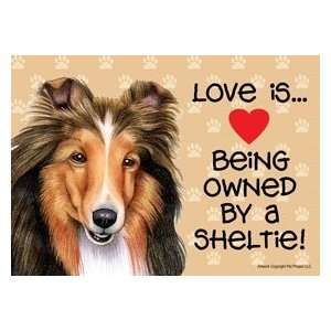     Love Is Being Owned by a Sheltie Wooden Sign 