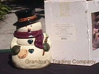 Up for auction is a unique crackle glazed snowman cookie jar, from 