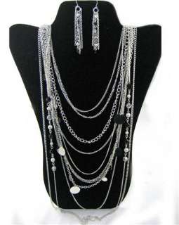 multi layered chains dangled discs embellished with white pearls black