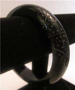   black, plastic, chunky, bangle bracelet with Art Deco design  
