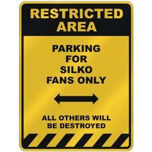  RESTRICTED AREA  PARKING FOR SILKO FANS ONLY  PARKING 