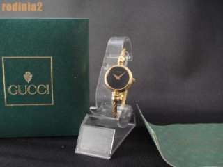   Ladies Gucci 2700L Black Dial Quartz Gold Wrist Watch Fair Condition