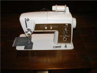   603 Sewing Machine w/ Wood Cabinet, Stool, Manual & Attachments  