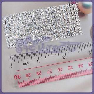   accented with sparkling rhinestone in a lovely silver tone setting