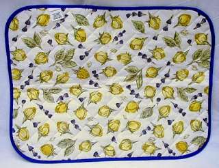   cotton quilted placemats from Pierre Deux. Designed by Clara Senteurs