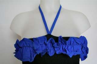 There is no fabric label. We would say that the ruffle and straps are 