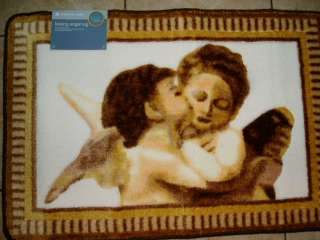   bath solutions kissing angel rug mat measures 20 x 30 inches
