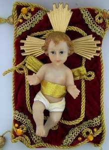 Baby Jesus Christmas Manger Statue On Velvet Red Pillow Gold Tassles 