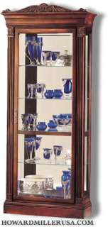   miller collectible curio display cabinet features a pediment crowned