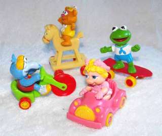   Set Of Four 1987 McDonalds Muppet Babies On Their Play Vehicles