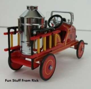   pedal car Fire Engine manufactured by Toledo Metal Wheel Company. It