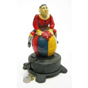   Clown on Globe Authentic Cast Iron Mechanical Bank