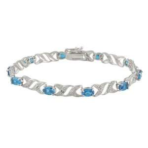    Sterling Silver Light Blue CZ X And O Tennis Bracelet Jewelry