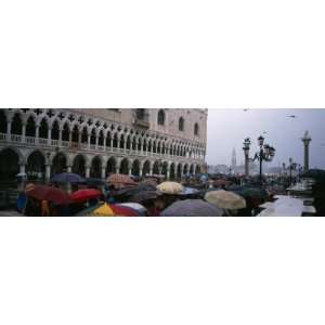  Tourists with Umbrellas on a Town Square, St. Marks 