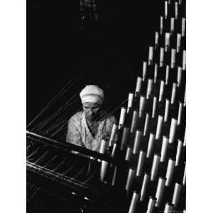 Russian Woman Working at Cloth Weaving Machine in a Textile Mill 